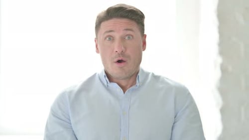 Surprised Man Looking at Camera Close Up