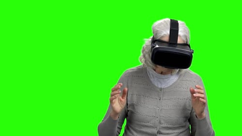 Senior Woman Using Virtual Reality Headset