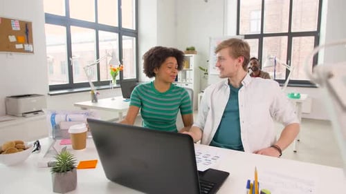 Creative Office Workers Discussing Project