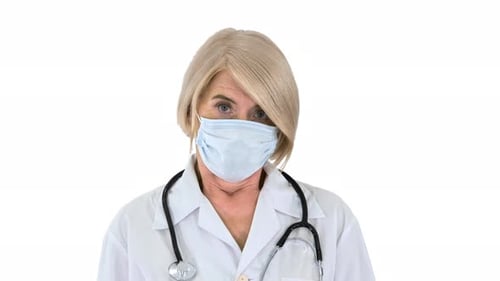Female Doctor Removing Face Mask on White Background