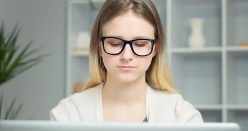 Young Woman Working On A Computer