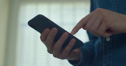 Hands of Young Man Using Smartphone at Home Office. Communication, Online Shopping, Chat, Social