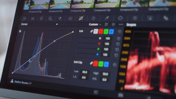 Color correction post production. Videographer editing footage on post ...