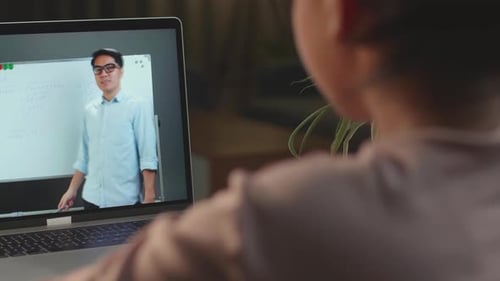 Child Engaged in Virtual Learning with Teacher