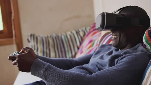 Man Wearing VR Headset Playing Video Game