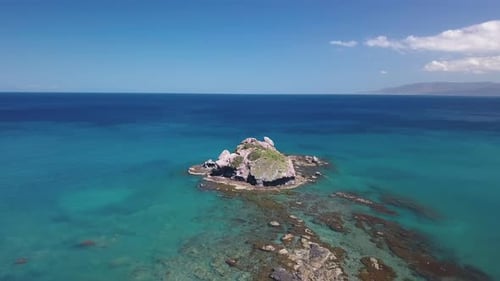 Amazing Small Island Near Stone Coast of Warm Tropical Sea, Aerial View