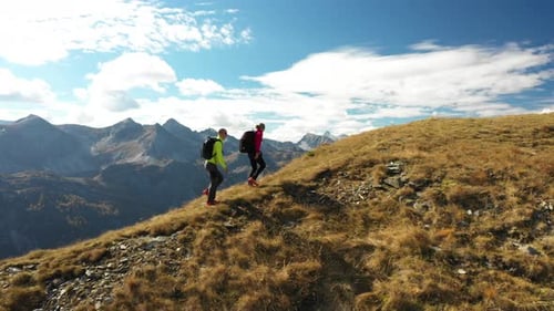 Aerial View Hiking Couple on Ridge Mountain Panorama Autumn