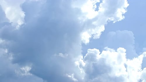 Stunning Huge Cumulus Clouds Swirl in the Daytime