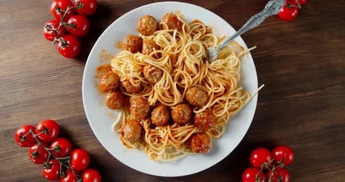 Ready Meatballs with Spaghetti Slowly Rotated