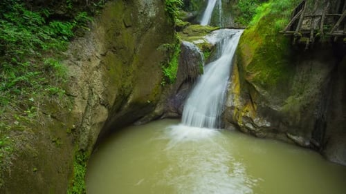 Grotto del Cagleron and Waterfall in Italy