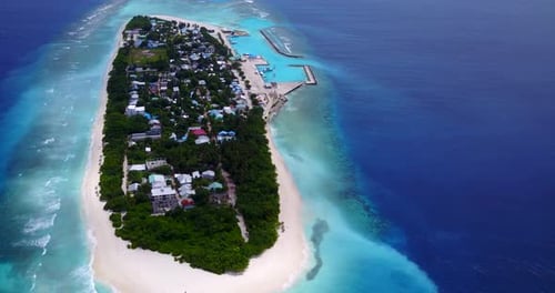 Tropical aerial copy space shot of a summer white paradise sand beach and turquoise sea background