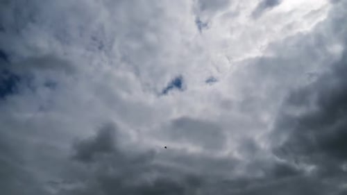 Dramatic Clouds Timelapse Against Blue Sky