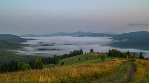 Misty Mountains and Foggy Valley at Twilight