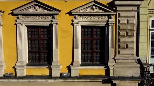 Facade of a European city building. Elements of architecture. Aerial drone view.