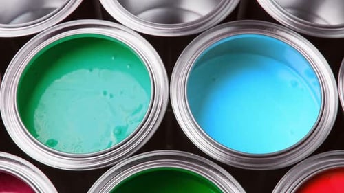 Opened Metal Can with Colors Paint Top View