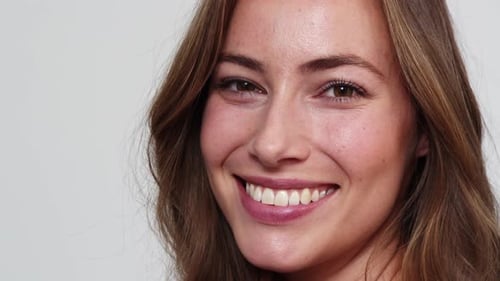 Smiling Woman with Brown Hair Close Up Portrait