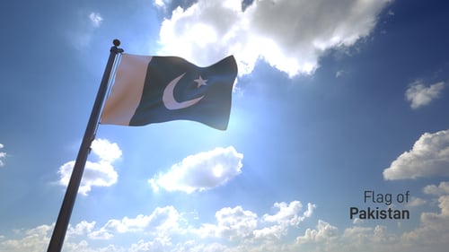 Waving Pakistan National Flag Against Bright Sunny Sky