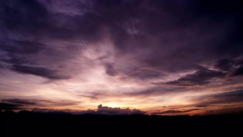 Dramatic Cumulus tropical cinematic cloudscape building up over the mountain turning into a tropical