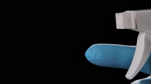 White Spray Bottle Sprays Fine Mist on Black