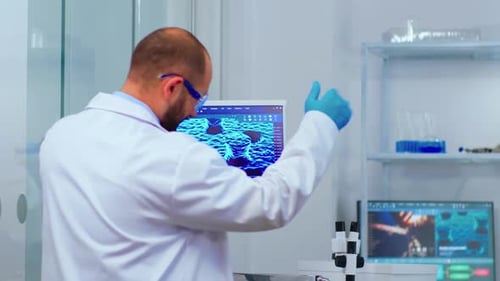 Scientists Reviewing Research Data in Laboratory