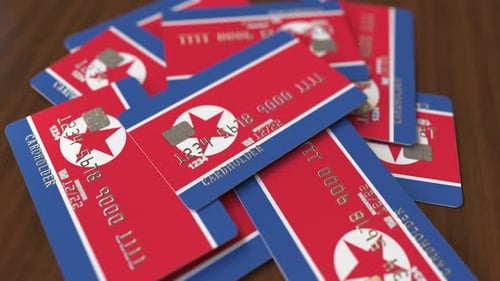 Pile of Credit Cards with Flag of North Korea