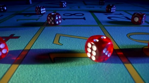 Dark Green Poker Table with Many Red Dice in Blue Light