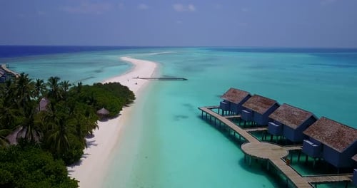 Wide fly over abstract view of a sunshine white sandy paradise beach and aqua blue water background