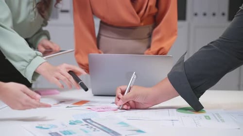 Close up hands of businessman and woman people group meeting in office brainstorm and work as team.