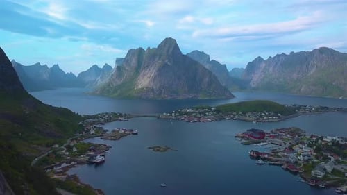 Flight Along the Rock and and Aerial View of Small Fishing Village