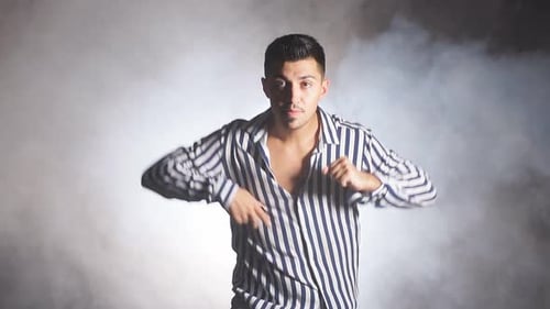 Young Street Dancer Boy Dancing on a Talent Show Competition Stage To Become Popular