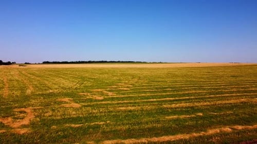 Aerial drone view of a flying over the rural agricultural landscape.
