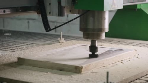 Automated CNC Milling Machine Carving Wood in Workplace