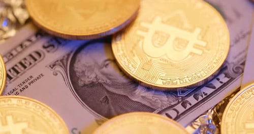 Bitcoin Coins on Dollar Bill, Close Up Shot