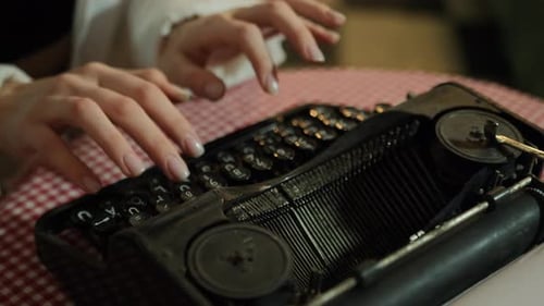 Secretary at Old Typewriter