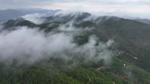 Clouds High in the Mountains Aerial View 4 K