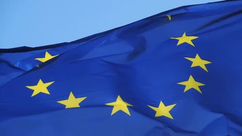 The European flag waving in the wind.