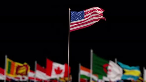 Waving Flags of Various Countries with United States Flag Focus