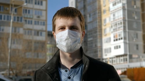 Young Adult Wearing a Medical Face Mask