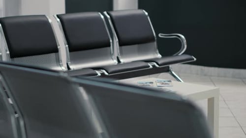 Modern Waiting Area with Black Chairs and Table