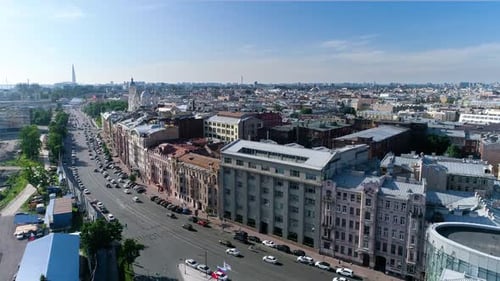 Panorama of St. Petersburg on a summer day. Wide highway with busy traffic.