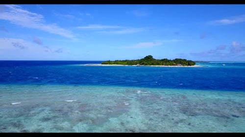 Aerial view landscape of exotic seashore beach break by blue ocean with white sandy background of jo