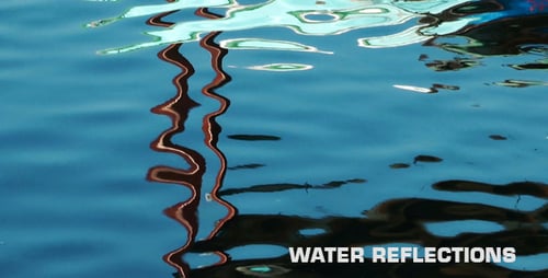 Boat Reflections Rippling on Water Surface