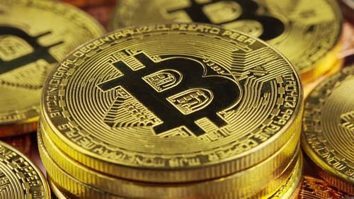 Close Up of Bitcoin Cryptocurrency Stacked Gold Coins