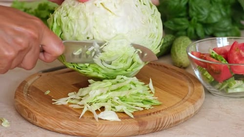 Cabbage Slicing on Cutting Board