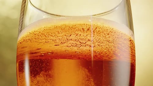 Close Up Of Bubbly Champagne Beverage In Glass