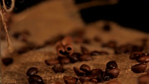 Coffee Beans and Cinnamon on Burlap with Jar