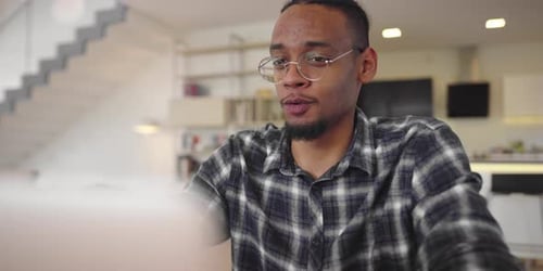 Young Adult Video Conferencing at Home