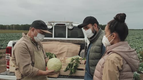 Showing Vegetables To Customers