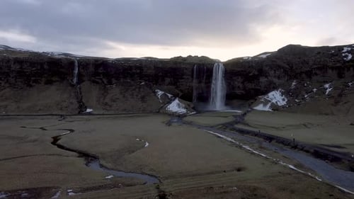 Seljalandsfoss waterfall in Iceland aerial panoramic view at sunrise