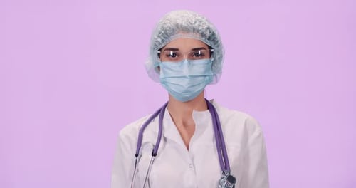 Female Doctor in Mask and Protective Gear